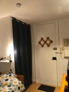 Posteľ alebo postele v izbe v ubytovaní Studio avec panorama sur la ville basse du Havre
