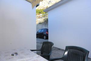 Fotografia z galérie ubytovania Apartments by the sea Mimice, Omis - 18148 v Mimiciach