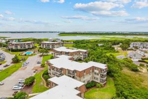 an aerial view of a apartment complex with a parking lot at Southwinds C8 in Atlantic Beach