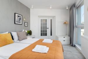 Postel nebo postele na pokoji v ubytování Apartament Prestige Centrum