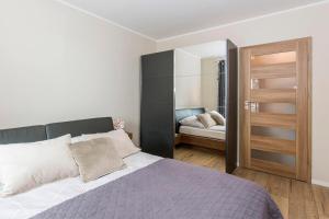 Posteľ alebo postele v izbe v ubytovaní Carmel Rentyear Apartments