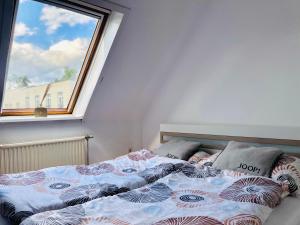 Posteľ alebo postele v izbe v ubytovaní KB Apartment