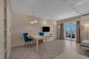 TV a/nebo společenská místnost v ubytování Heritage Hotel Liberan