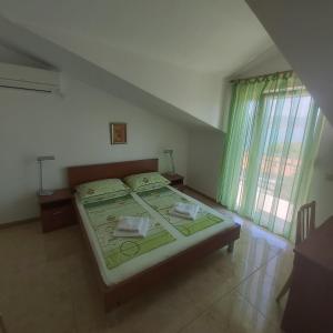 Fotografia z galérie ubytovania Apartments by the sea Slatine, Ciovo - 18311 v Slatine