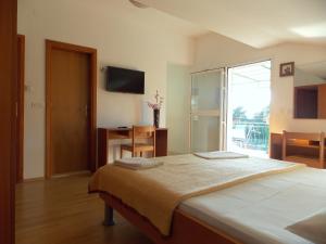 Posteľ alebo postele v izbe v ubytovaní Apartments with a parking space Mokalo, Peljesac - 18395