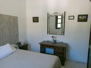 Cama o camas de una habitación en Estación de Coripe