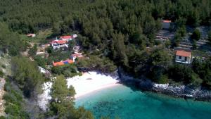 an aerial view of a house and a beach at Holiday Home Maja in Žrnovo