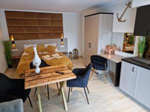 Una cocina o cocineta en Ambre Mare Bursztynowe Apartamenty Pobierowo