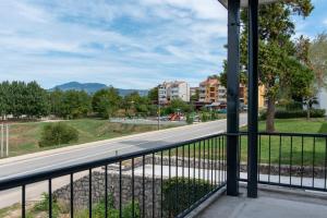 a view of a road from a balcony at Hostel Potpican in Potpićan