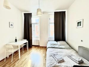 Postel nebo postele na pokoji v ubytování Maison Residence Prague