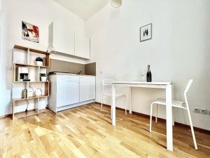 Kuchyň nebo kuchyňský kout v ubytování Maison Residence Prague