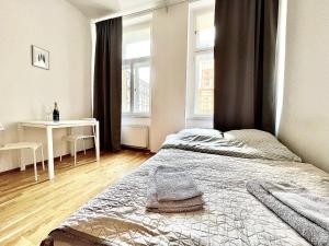 Postel nebo postele na pokoji v ubytování Maison Residence Prague