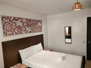 Postel nebo postele na pokoji v ubytování Hotel Rupert A Baler