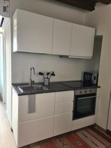 Kuchyňa alebo kuchynka v ubytovaní Appartamento Tortona - Milano