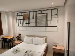 Postel nebo postele na pokoji v ubytování Hotel Rupert A Baler