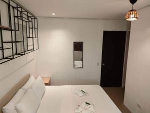 Postel nebo postele na pokoji v ubytování Hotel Rupert A Baler