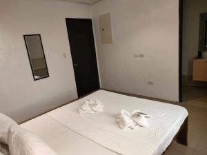 Postel nebo postele na pokoji v ubytování Hotel Rupert A Baler