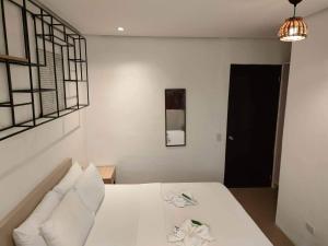 Postel nebo postele na pokoji v ubytování Hotel Rupert A Baler