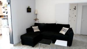 Posedenie v ubytovaní Appartement Climatisé Vue Mer Route des Sanguinaires
