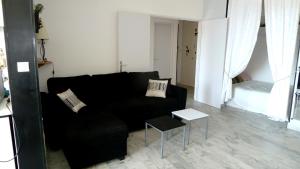 Posedenie v ubytovaní Appartement Climatisé Vue Mer Route des Sanguinaires