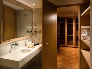 Koupelna v ubytování Novotel Vijayawada Varun