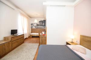 Posteľ alebo postele v izbe v ubytovaní Hotel Džbán