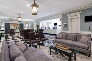 a living room with a couch and chairs at Natural Bridge Hotel, Trademark Collection by Wyndham in Natural Bridge