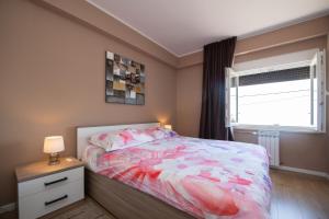 Postel nebo postele na pokoji v ubytování Apartment Carmen Opatija