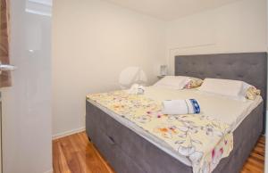 Łóżko lub łóżka w pokoju w obiekcie Mobile home Dandelion