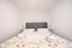 Łóżko lub łóżka w pokoju w obiekcie Mobile home Dandelion