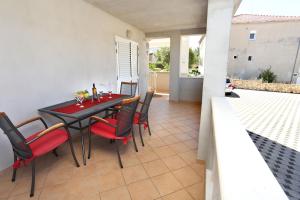 Ein Balkon oder eine Terrasse in der Unterkunft Apartments Marin
