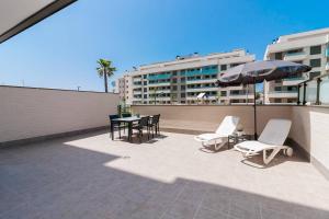 A balcony or terrace at LivinMálaga Los Álamos Suites II