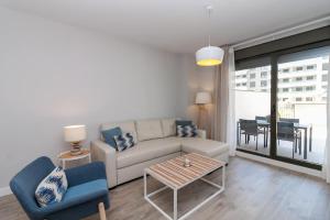 Гостиная зона в LivinMálaga Los Álamos Suites II