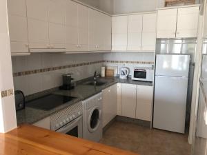 Kuchnia lub aneks kuchenny w obiekcie L' Azotea del Sol appartement typique