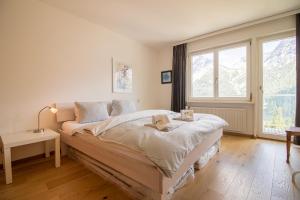 Postel nebo postele na pokoji v ubytování Viktoria B42 by Arosa Holiday