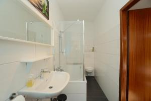 Koupelna v ubytování Ferienwohnung Seestern in zentraler Lage von Eckernförde + 22 fotografií