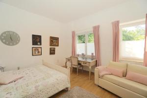 Postel nebo postele na pokoji v ubytování Ferienwohnung Seestern in zentraler Lage von Eckernförde