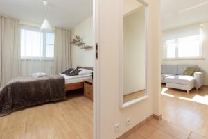 Posteľ alebo postele v izbe v ubytovaní Belgradzka Apartment Warsaw by Noclegi Renters