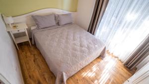 Postel nebo postele na pokoji v ubytování Alaçatı Private