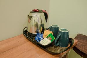 Príslušenstvo na prípravu kávy alebo čaju v ubytovaní Vedana Retreat Arambol