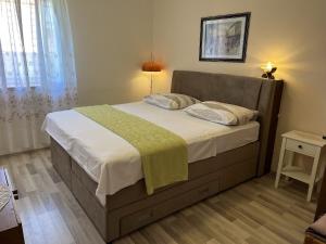 Postel nebo postele na pokoji v ubytování House Lara