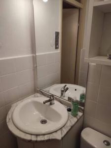 a bathroom with a sink and a toilet at Your Stay in Kelmis - La Calamine- Cosy apartment in the Ardennes -Three-country point in Kelmis