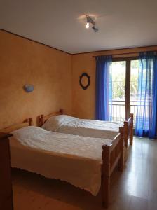 Katil atau katil-katil dalam bilik di 8COL12 Villa de caractère avec piscine privé