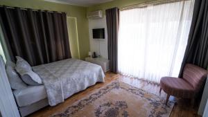 Postel nebo postele na pokoji v ubytování Alaçatı Private