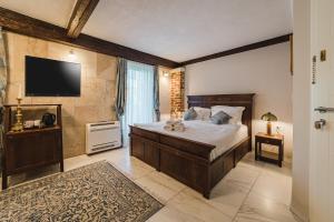 Postel nebo postele na pokoji v ubytování Casa Ra