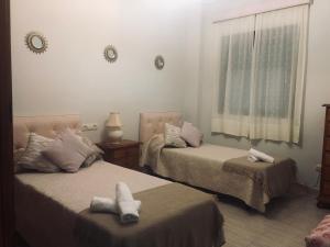 A bed or beds in a room at Like Home