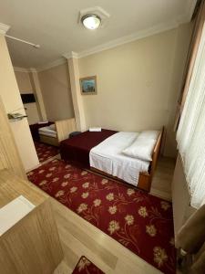 アモーレ ホテル イスタンブールにあるベッド