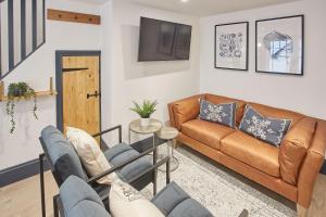 O zonă de relaxare la Grumbles Cottage at Loggerhead Yard