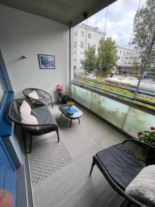 Posezení v ubytování Cozy centre apartament Kuopio