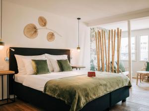 Ліжко або ліжка в номері Hotel Krone Thun